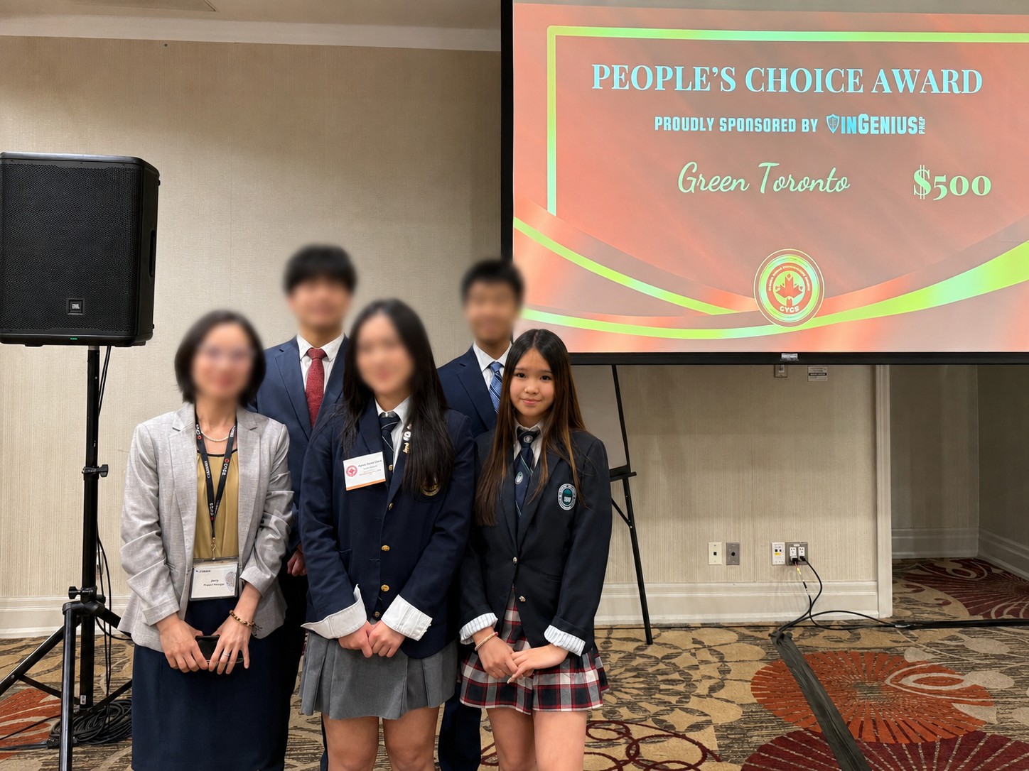 Mia and teammates receiving the People's Choice Award for Green Toronto